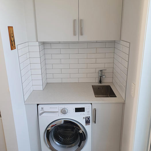 White Tiling laundry renovation