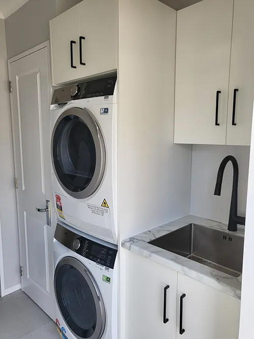 Stack machines laundry room after