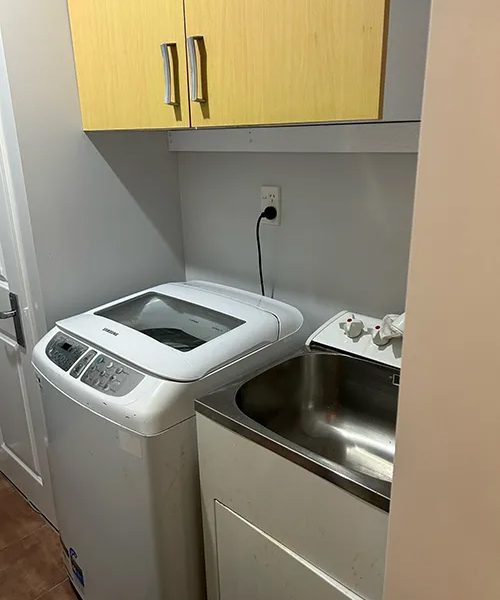 Stack machines laundry room before