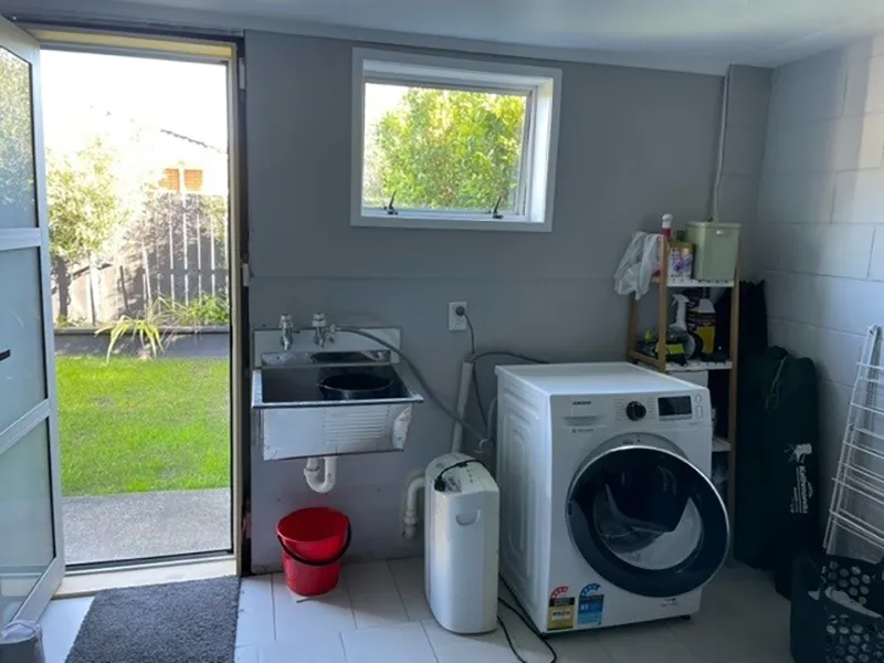 north shore laundry room before