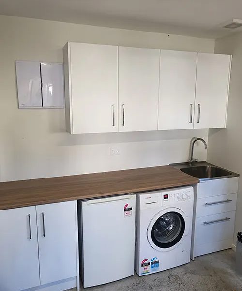 small laundry room after improvements