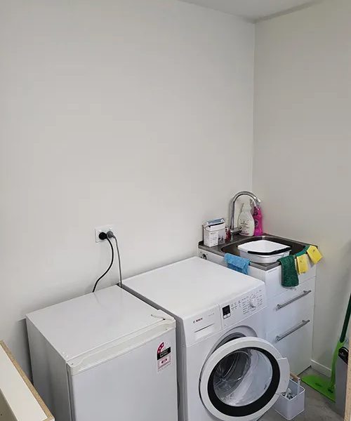 small laundry room before improvements